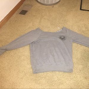 Pink of the shoulder hoodie.